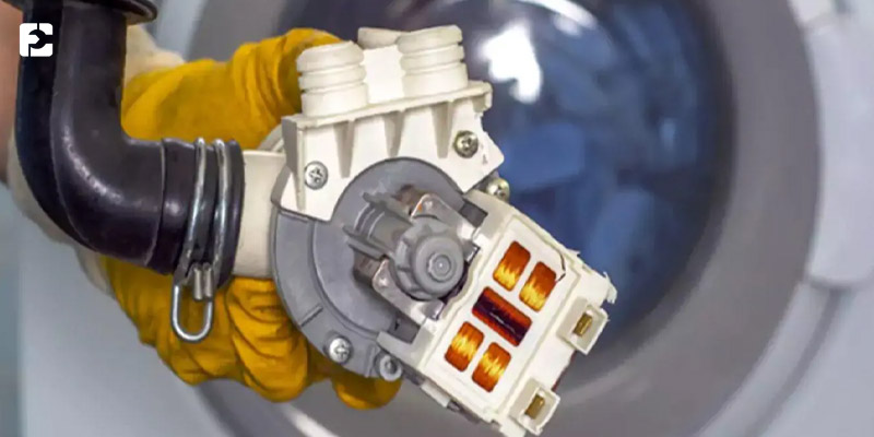 تست پمپ تخلیه برای تعویض آب بندی ماشین لباسشویی